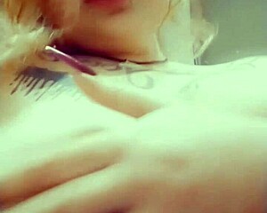 curvy redhead girl teases her big boobs 😏