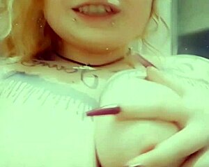 curvy redhead girl teases her big boobs 😏