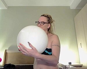 Watch me blow this white balloon until it pops for looners.