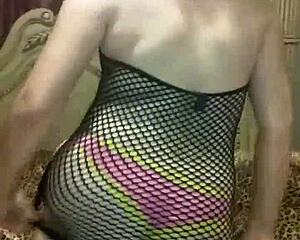 A beautiful black girl doing sensual striptease and dancing