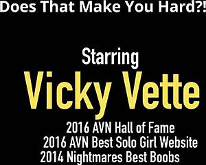 Blonde milf Vicky Vette lubricates huge dildo for deep fingering orgasm.