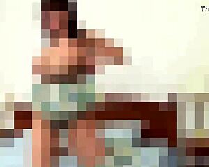 Slender gay in stockings fucks with a toy