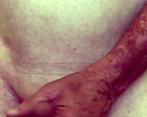 Mature shaved woman almost caught masturbating her hairless pussy in close up.