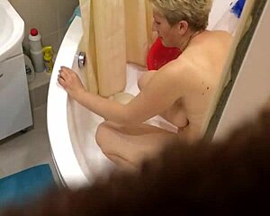 the girl with big tits and ass got washed in the garage