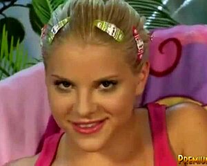 Blonde teen performs striptease undressing