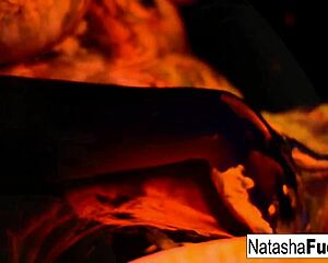 busty natasha nice shoots a fun and sexy black light video