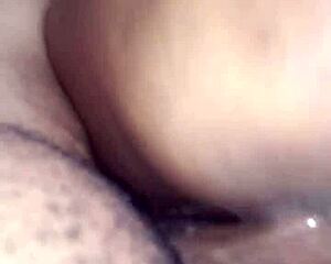 this ebony babe's creamy and juicy body shines in homemade fun