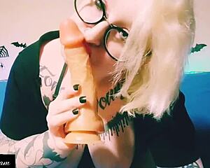 European babe blonde gets horny and starts sucking on a dildo