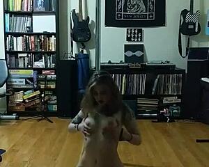 i strip on the dark pole, teasing with my big tits and tattooed ass