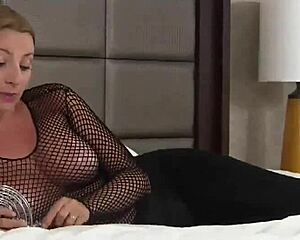 She controls his cock in humiliating femdom handjob.