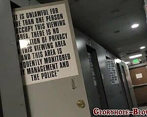 teen interacts with black gloryhole