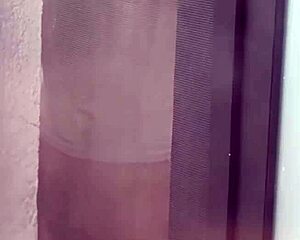 hot milf strips fully naked for voyeur