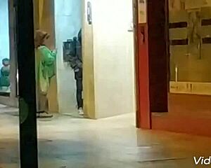 Handjob given on public road in outdoor setting