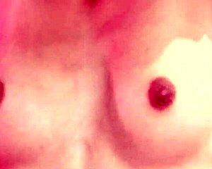 demi a plays with blue dildo