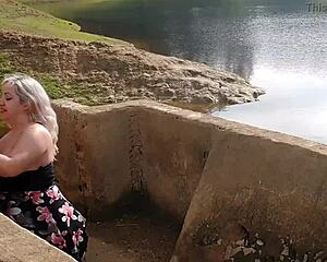 Blonde slut gives blowjob and gets creampie in outdoor lagoon sex!