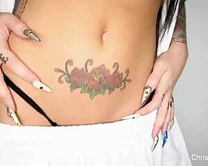 Christy Mack engages in a playful tease performance