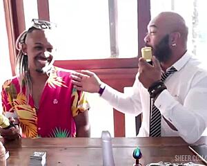 A black couple enjoys a sensual RJ session at the Santa Caliente event in sheer red lingerie