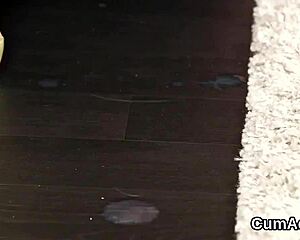 Wicked hottie enjoys blowbang with cumshots all over her face.