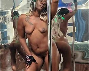 naej gets on the pole and reaches clit orgasm with toys