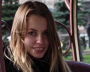 Malvina rips clothes in bold striptease at shop.