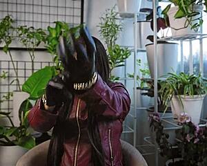 Fetishism, namely leather and glove in ASMR video