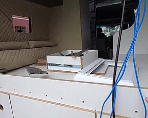 JoJo Kleber and her group explore a motorhome workshop in California with Monique Bertolini