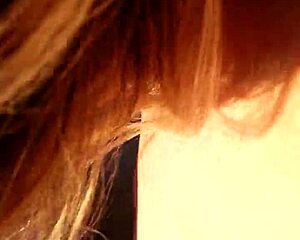 Just doing the yard work in a suggestive outdoor scene.