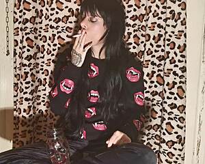 Young goth Hungarian girl enjoys kinky smoking session after hard day at work
