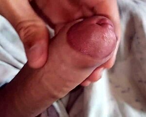 beautiful latina redhead gives handjob to horny monster cock, teasing the swollen head