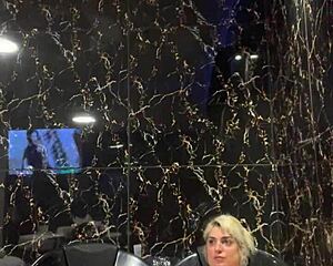 who wants to join this blonde tattooed girl in the jacuzzi for some wet fun