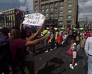 Latina flashing big ass in miniskirt during LGBT march. 😘 Want a kiss?