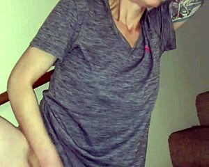 wife rubbing pussy on stairs, shaved and tattooed