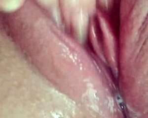 An all hairless babe gets herself off in steamy close up