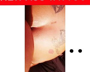 npleasures bends over to display new ass tattoo