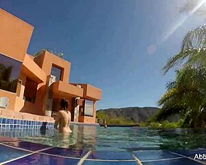 Abigail Mac enjoys poolside relaxation