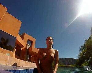 Abigail Mac enjoys poolside relaxation