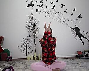 mature woman teaches yoga lesson to friend