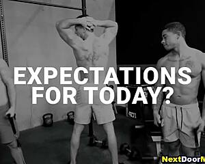 Muscular jocks banging in gay threesome sex after sweaty gym workout.