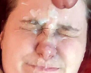 an amateur girl gets her face covered in cum
