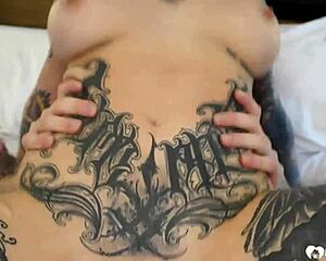 Just watched this tattooed beauty ride wild in a cowgirl session