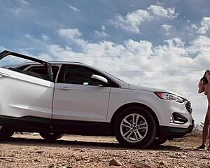 Risky roadside sex with a hot blonde flashing her bare assets outdoors.