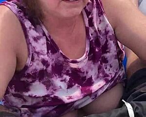 imagine this milf couple outdoors, her big natural tits bouncing as she gives a blowjob leading to cum