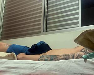 Watch this tattooed amateur soloboy masturbate