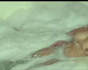 Enjoy a sneak peek at a hot scene with a hairless beauty giving a blowjob and getting a massage with oil and agarabas.