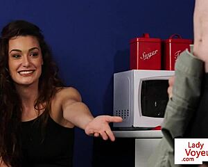 Cute Babe Spreads Legs to Guide a Jerking Guy in Kitchen