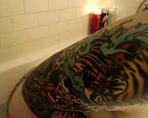 Final bath show featuring tattoos