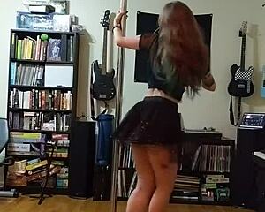 blonde milf strips out of her black skirt and heels, teasing with big tits and ass