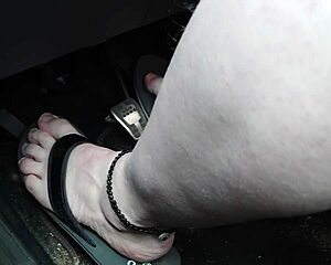 barefoot babe in flip flops driving