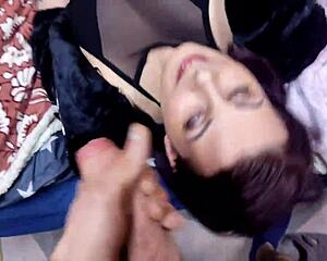 Emily Purple in her fur coat deepthroats a monster cock and takes cum all over her face