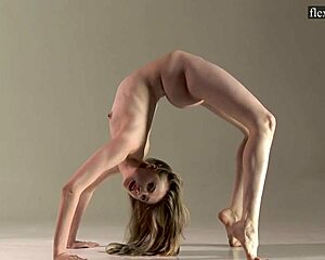 Hot Russian girl Sofia Zhiraf shows her athletic skills and opens her legs